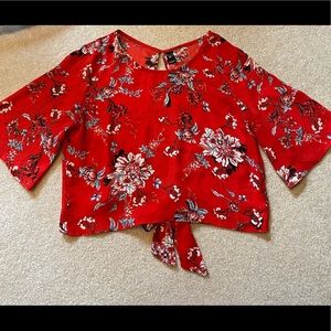 Red floral blouse